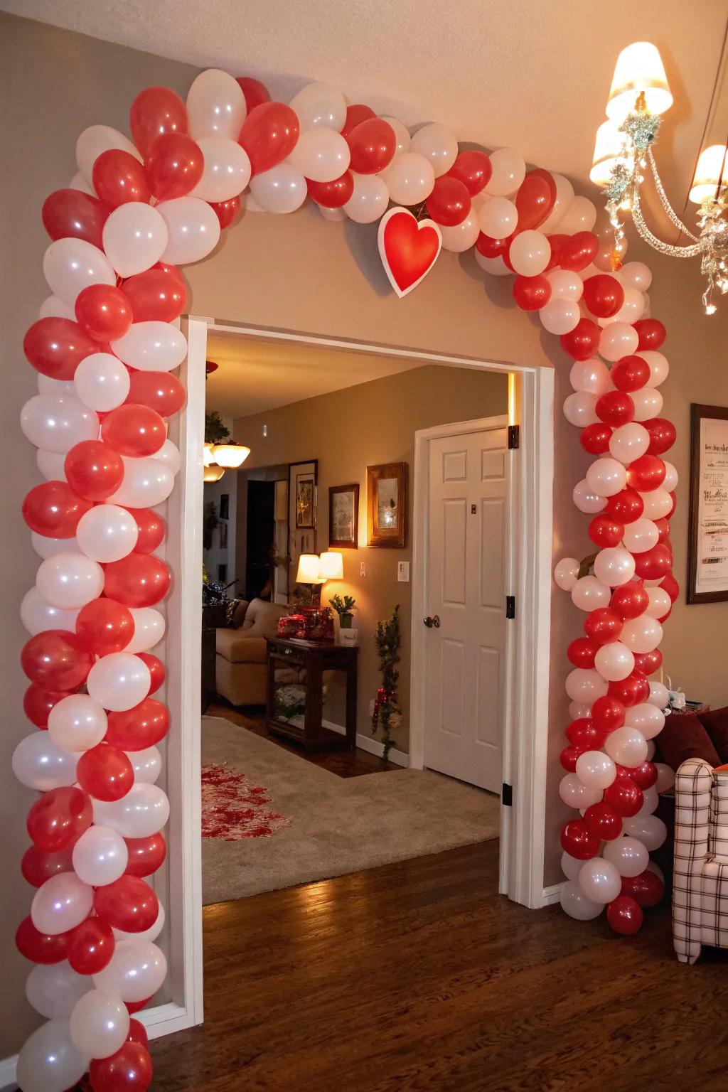 Welcome guests with a romantic heart-shaped balloon arch.