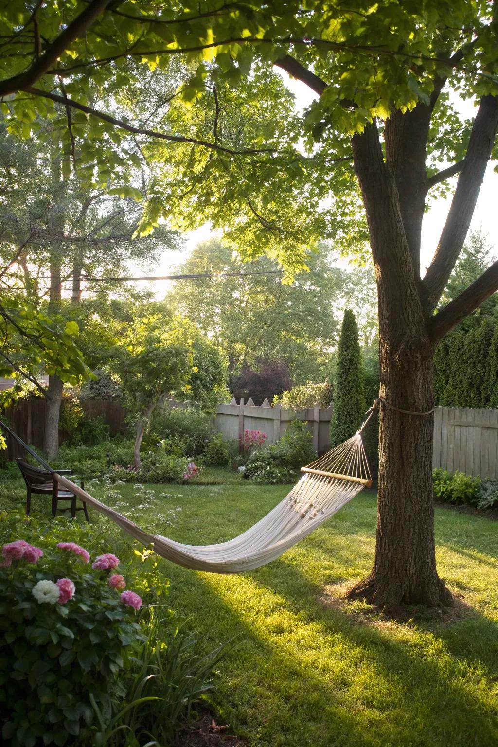 A peaceful hammock setup in a lush backyard, ideal for relaxation.