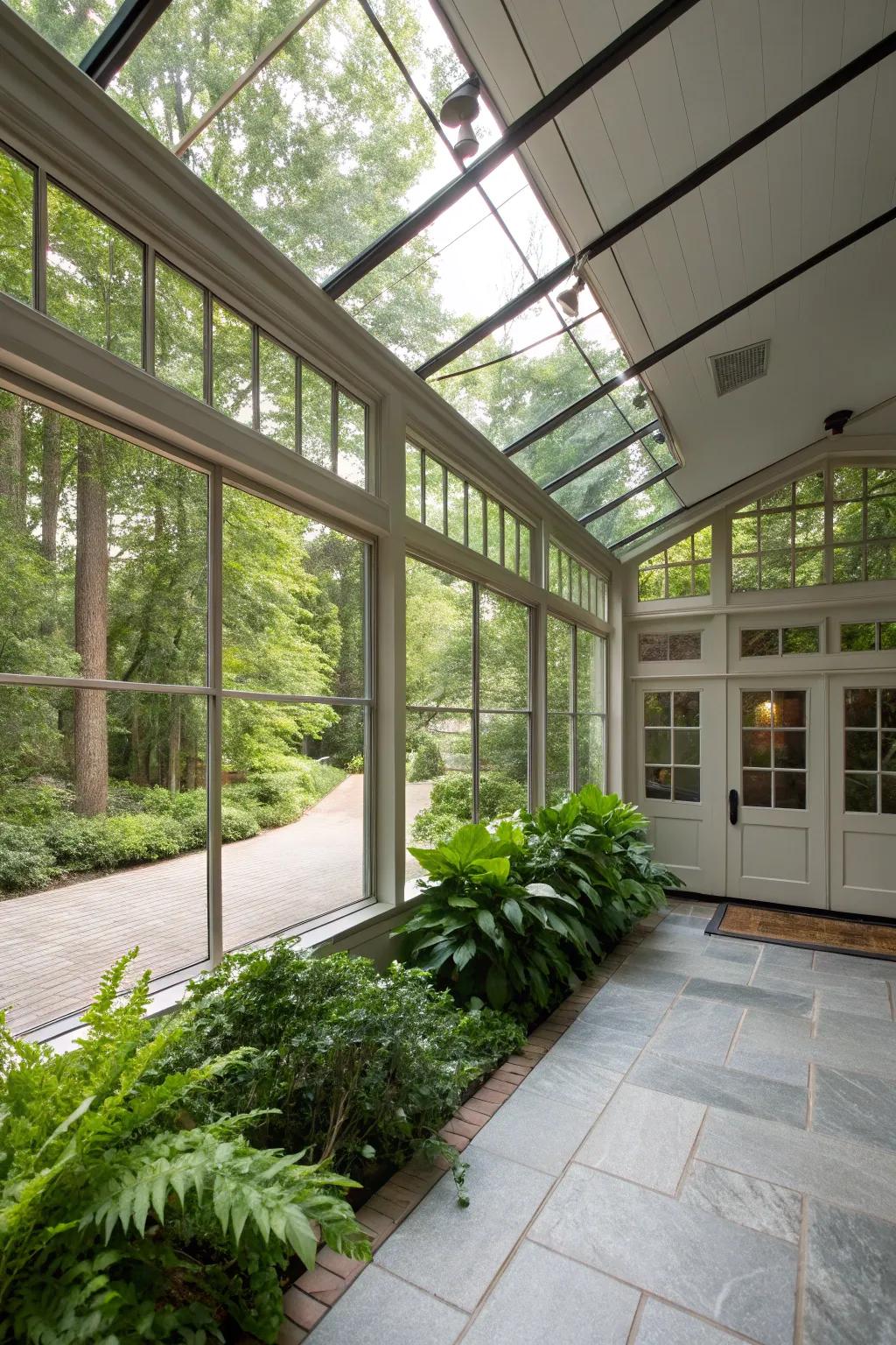 A glass-enclosed breezeway that invites the outdoors in, creating a light-filled transition from garage to house.