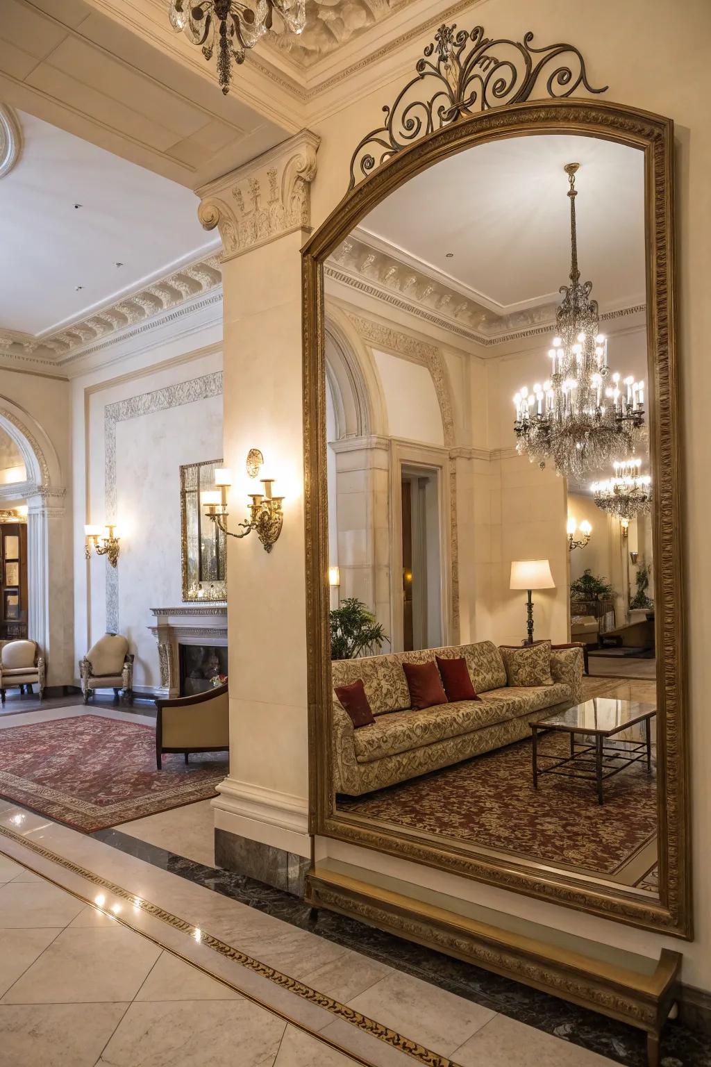 An oversized mirror in the entryway creates a dramatic and spacious effect.