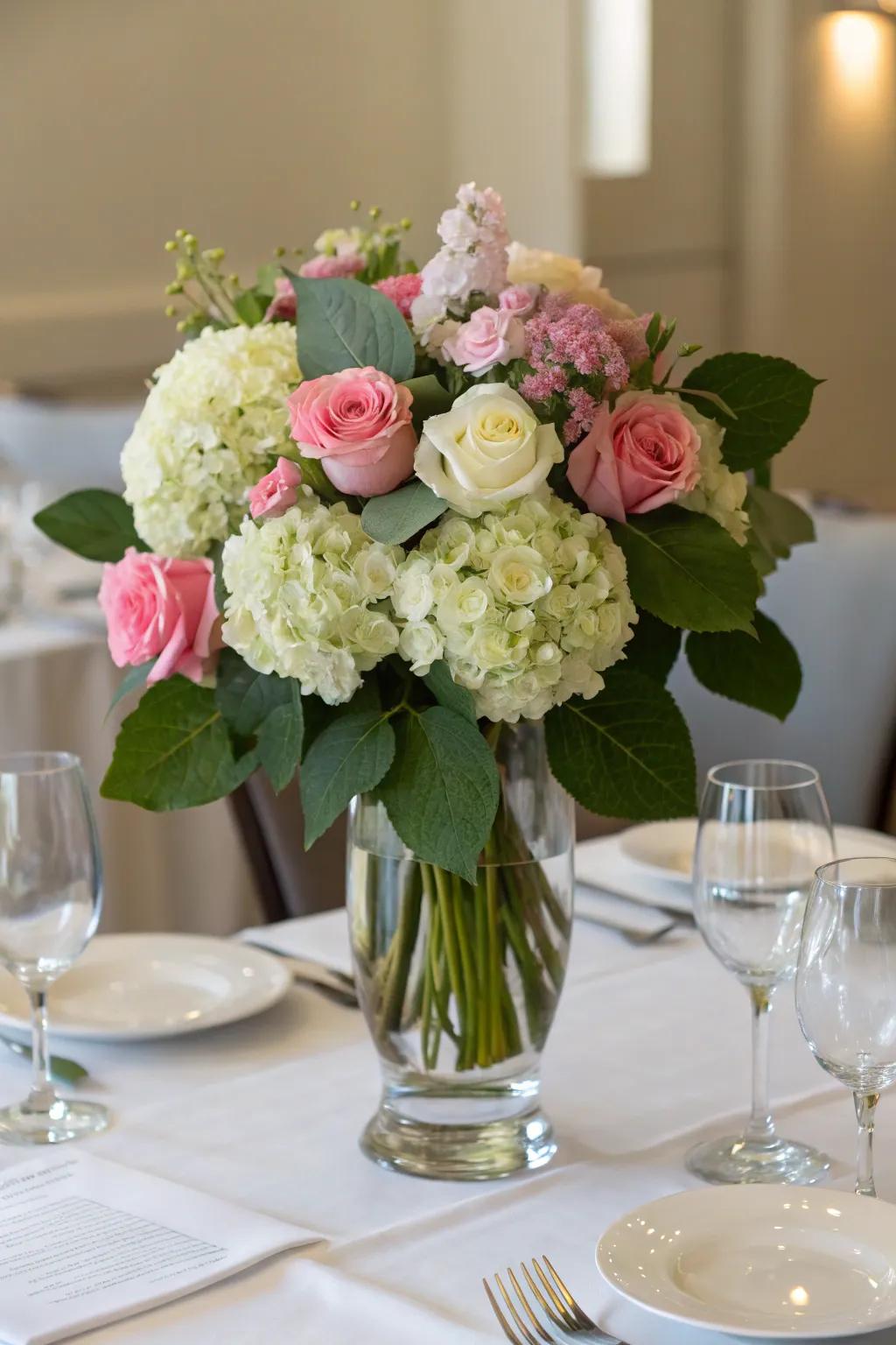 Refined botanical compositions of roses and 'snowballs'.