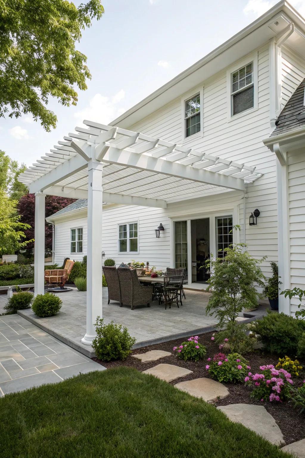 A stylish white pergola that enhances shade and charm to the outdoor area.