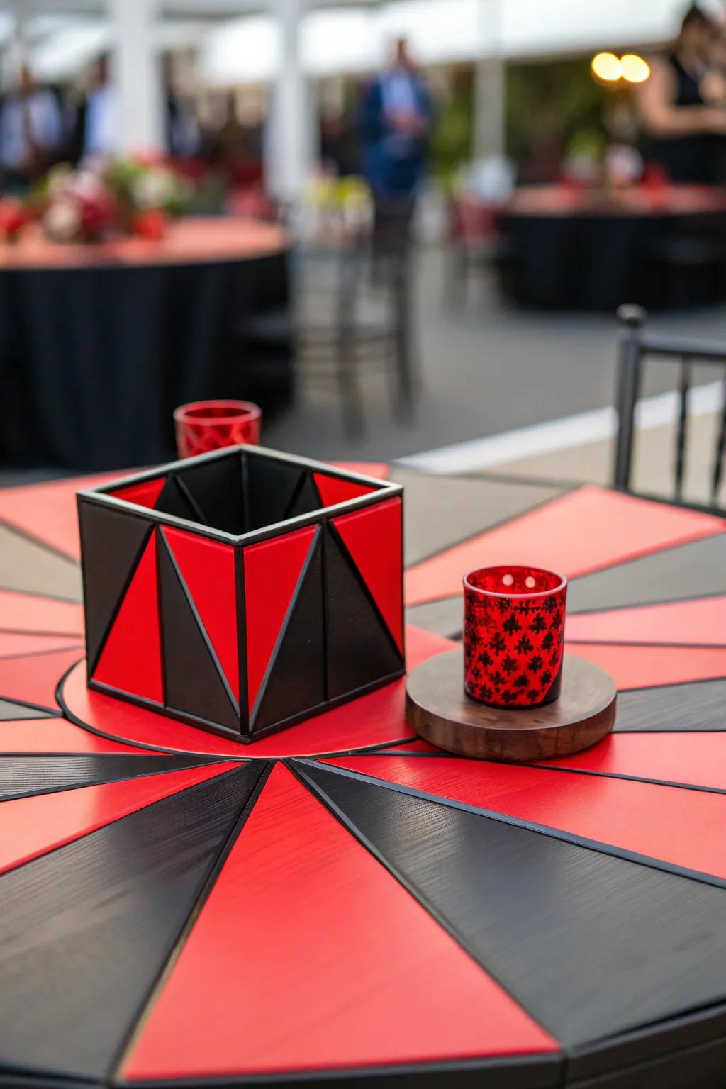 Geometric shapes in black and red add a modern twist to the centerpiece.