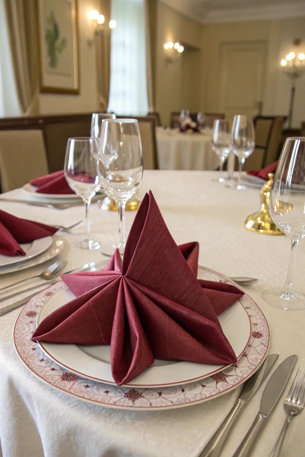 The star burst napkin fold, a dazzling centerpiece.