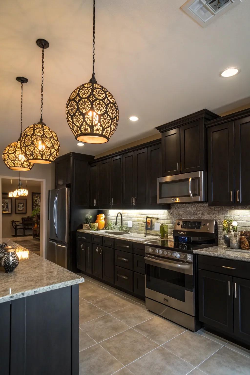 Dark cabinets illuminated by artistic pendant lighting for a creative kitchen space.