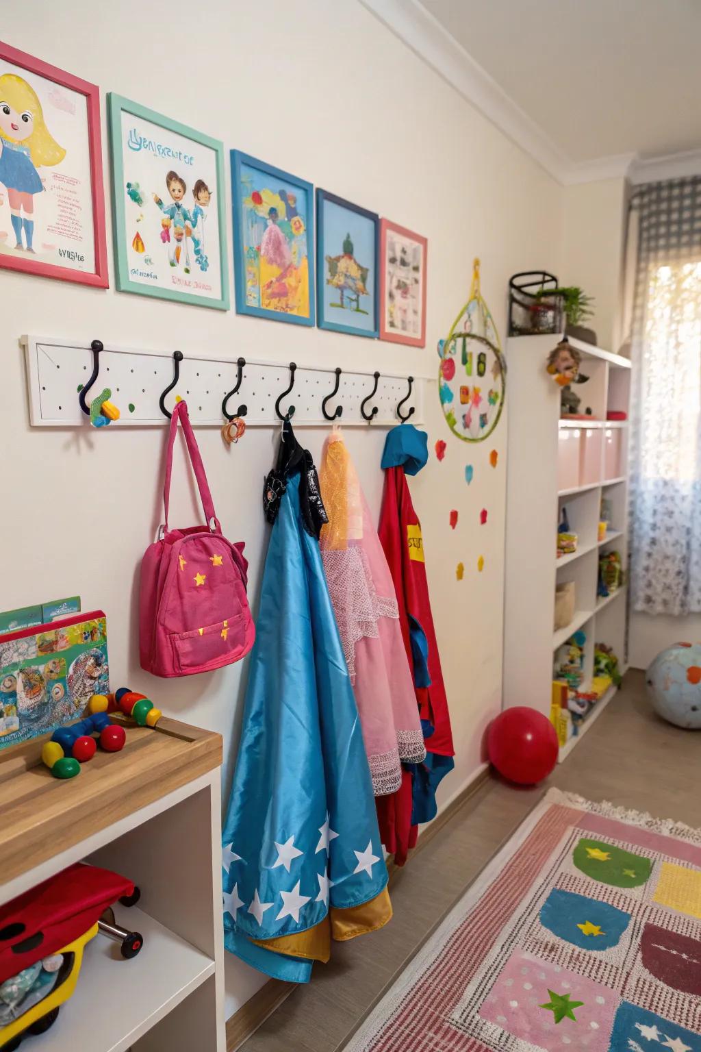 Hooks in a playroom used for hanging dress-up clothes, keeping them off the floor.