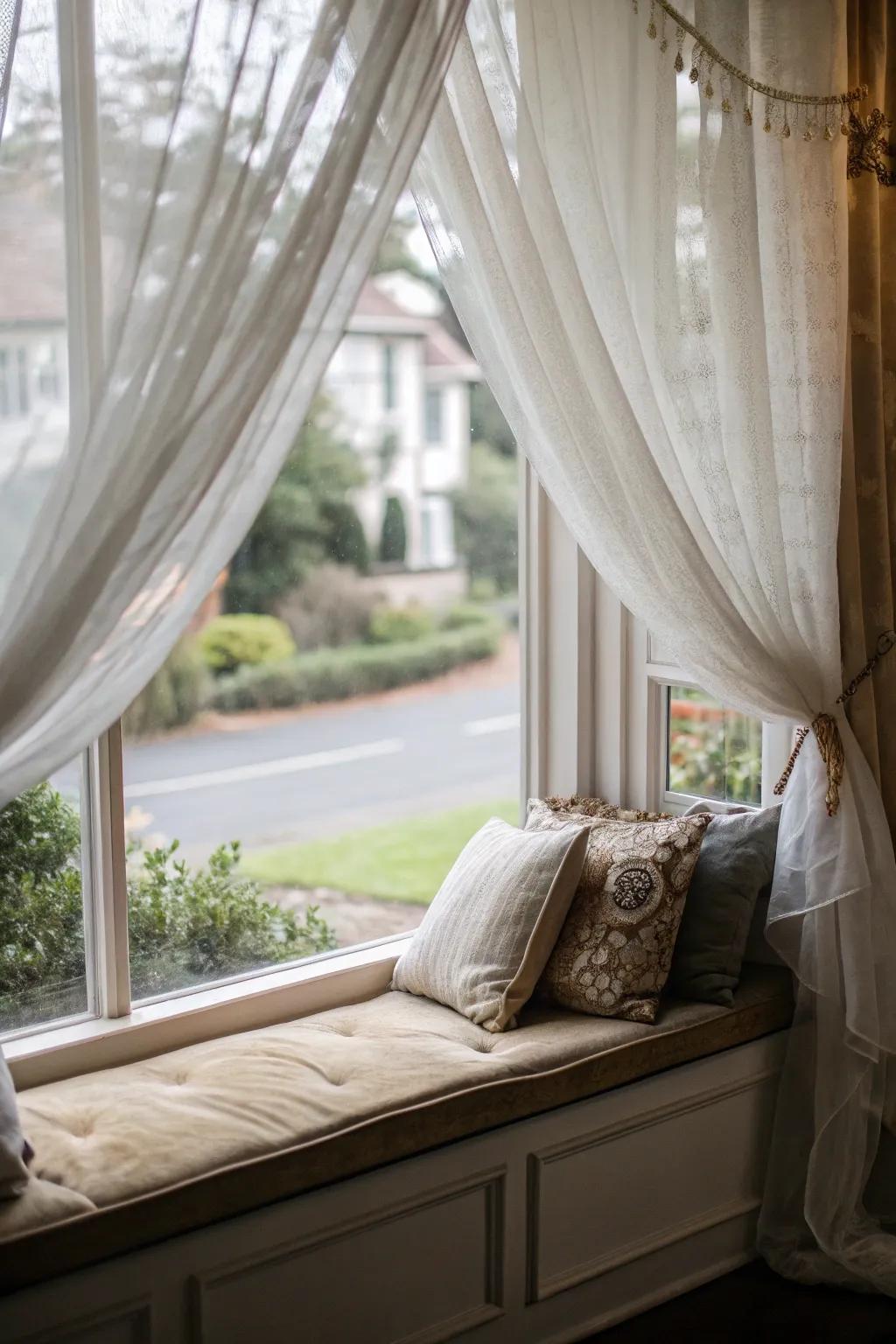 A window seat with drapes for added privacy and a touch of elegance.