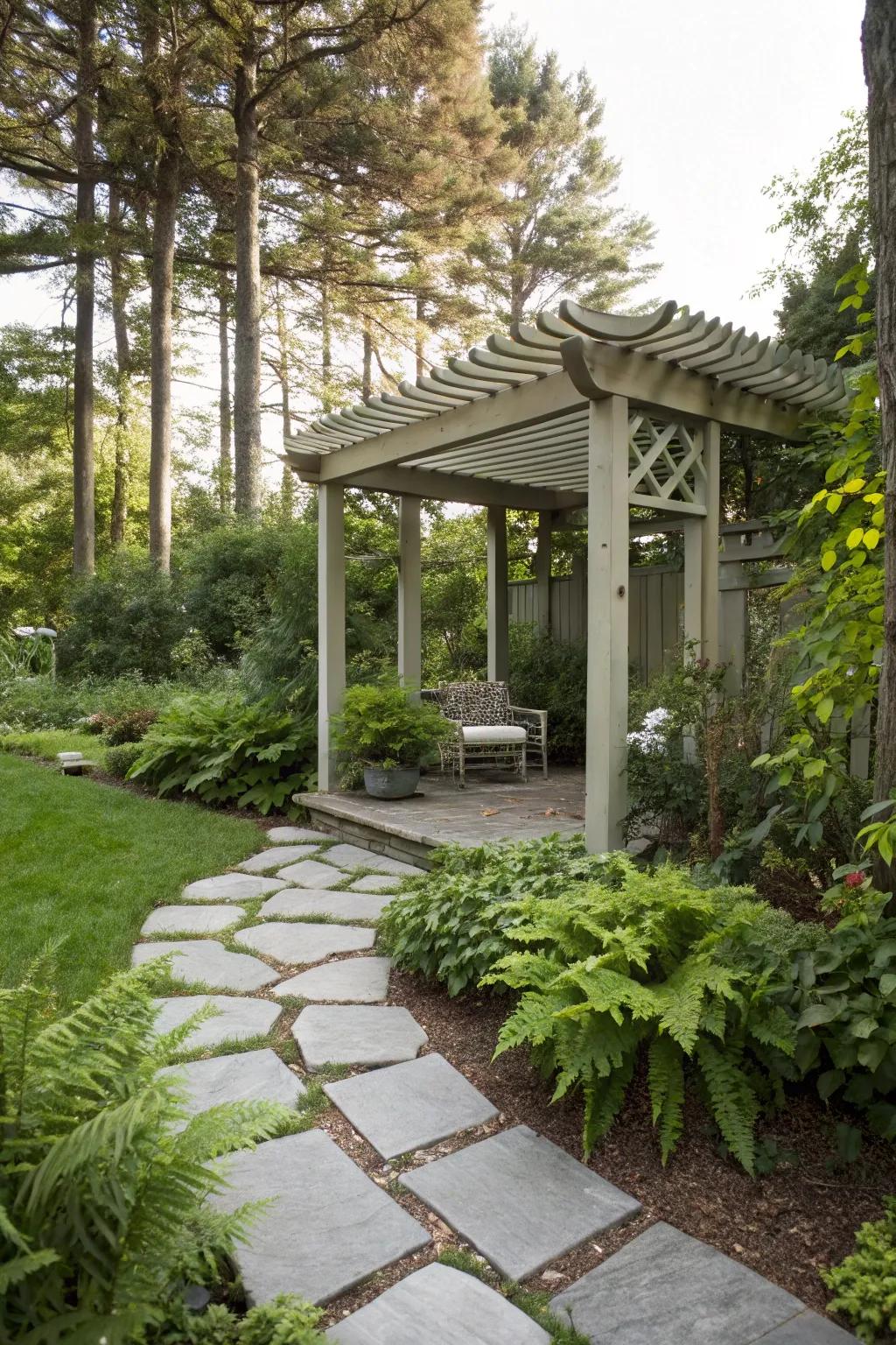 A stone pathway enhances the approach to a small pergola.