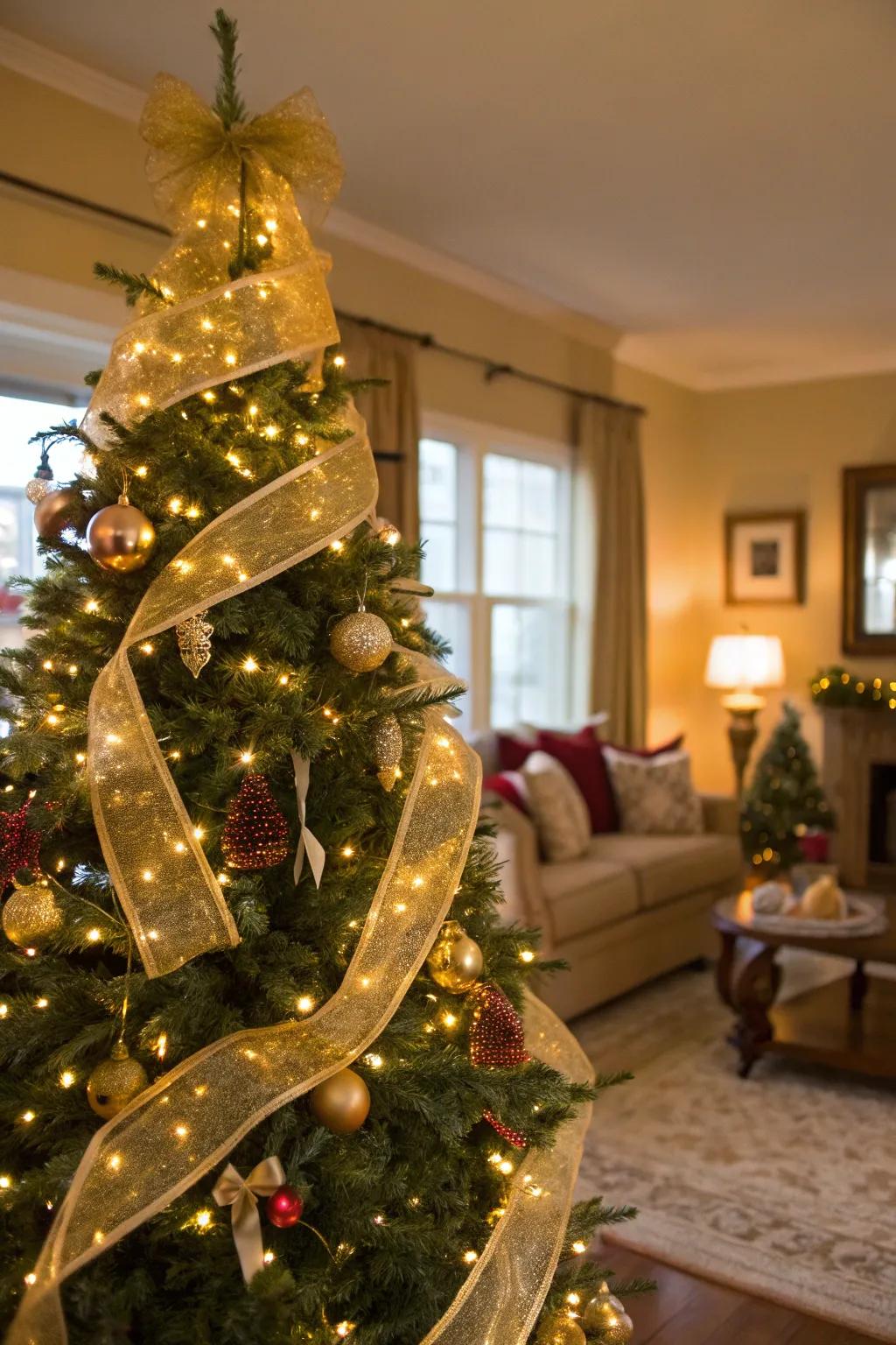 Golden ribbons add an elegant cascade effect to the tree.