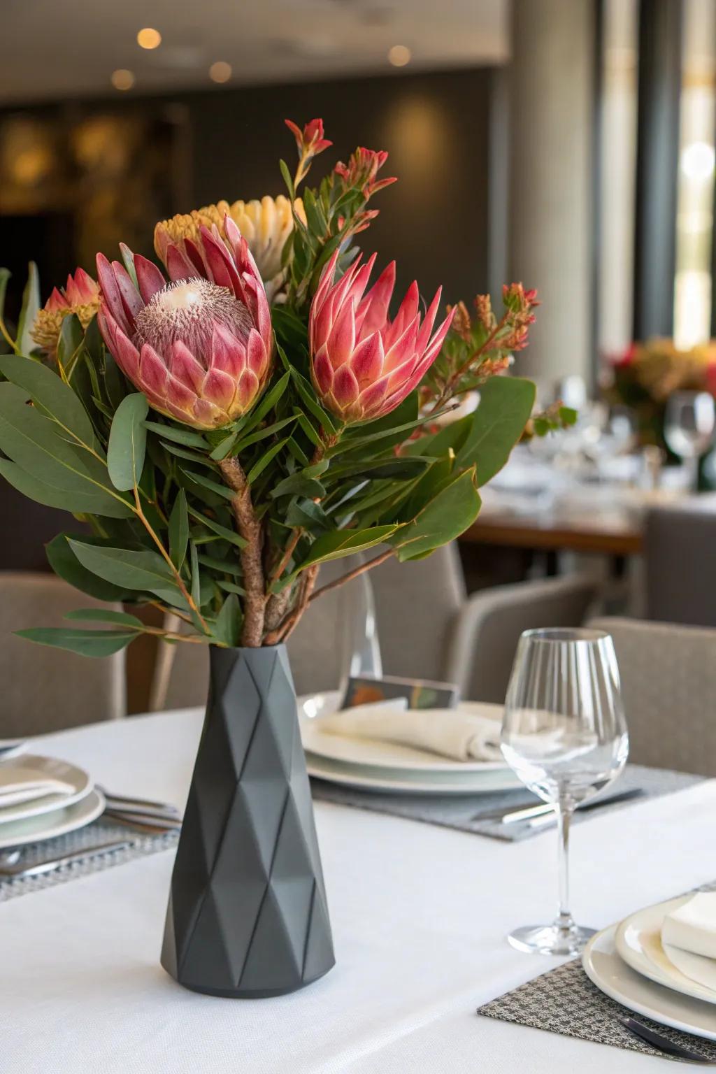 Audacious protea centerpiece forging a striking impact.
