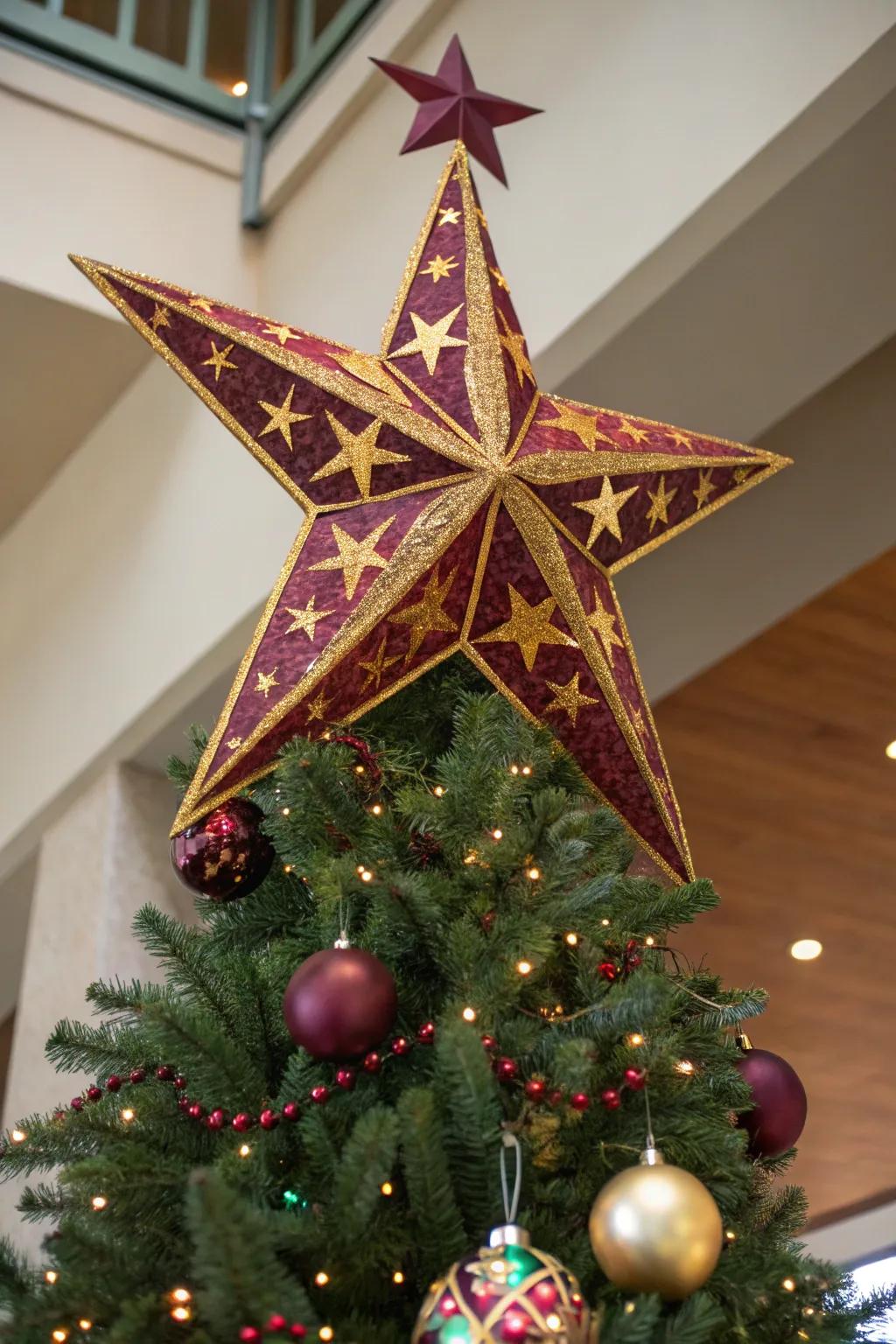 A striking burgundy and gold tree topper completes the look.