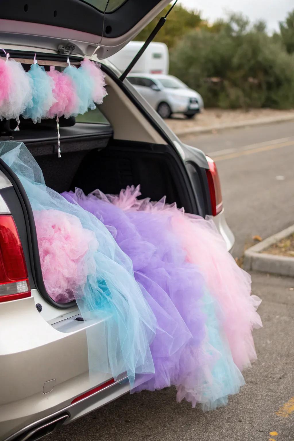 A whimsical cotton candy-themed trunk, decorated with pastel tulle and cotton.