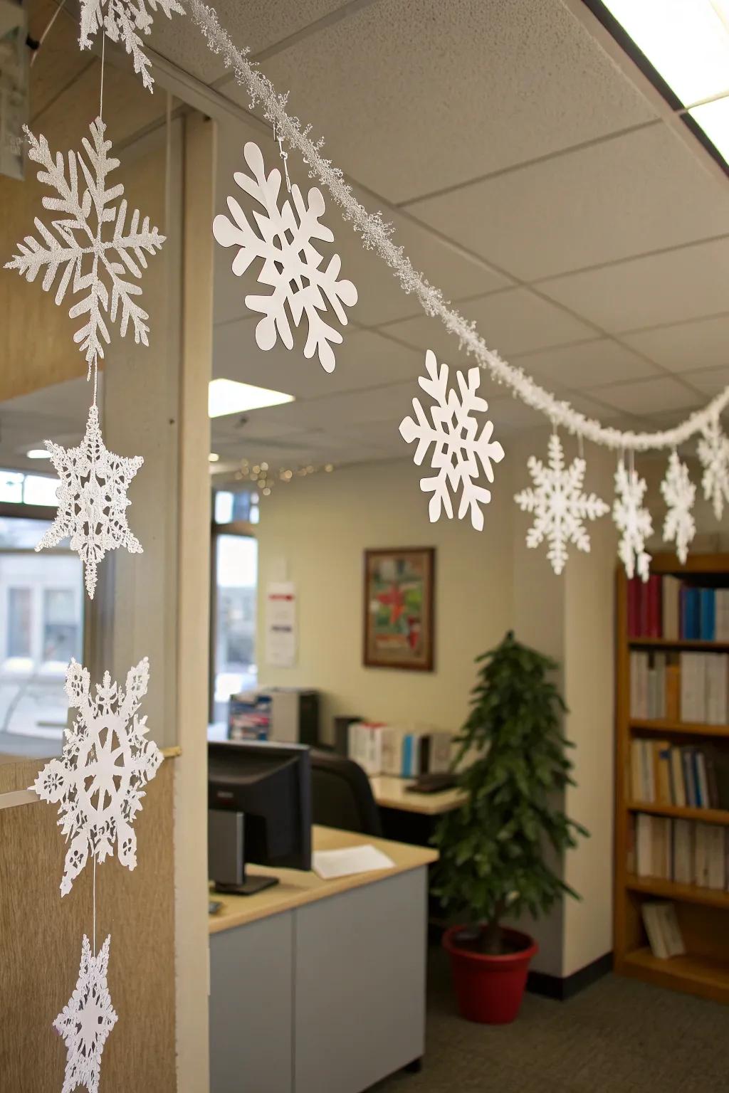 Crafted snowflake garland adds a touch of winter to your workspace.