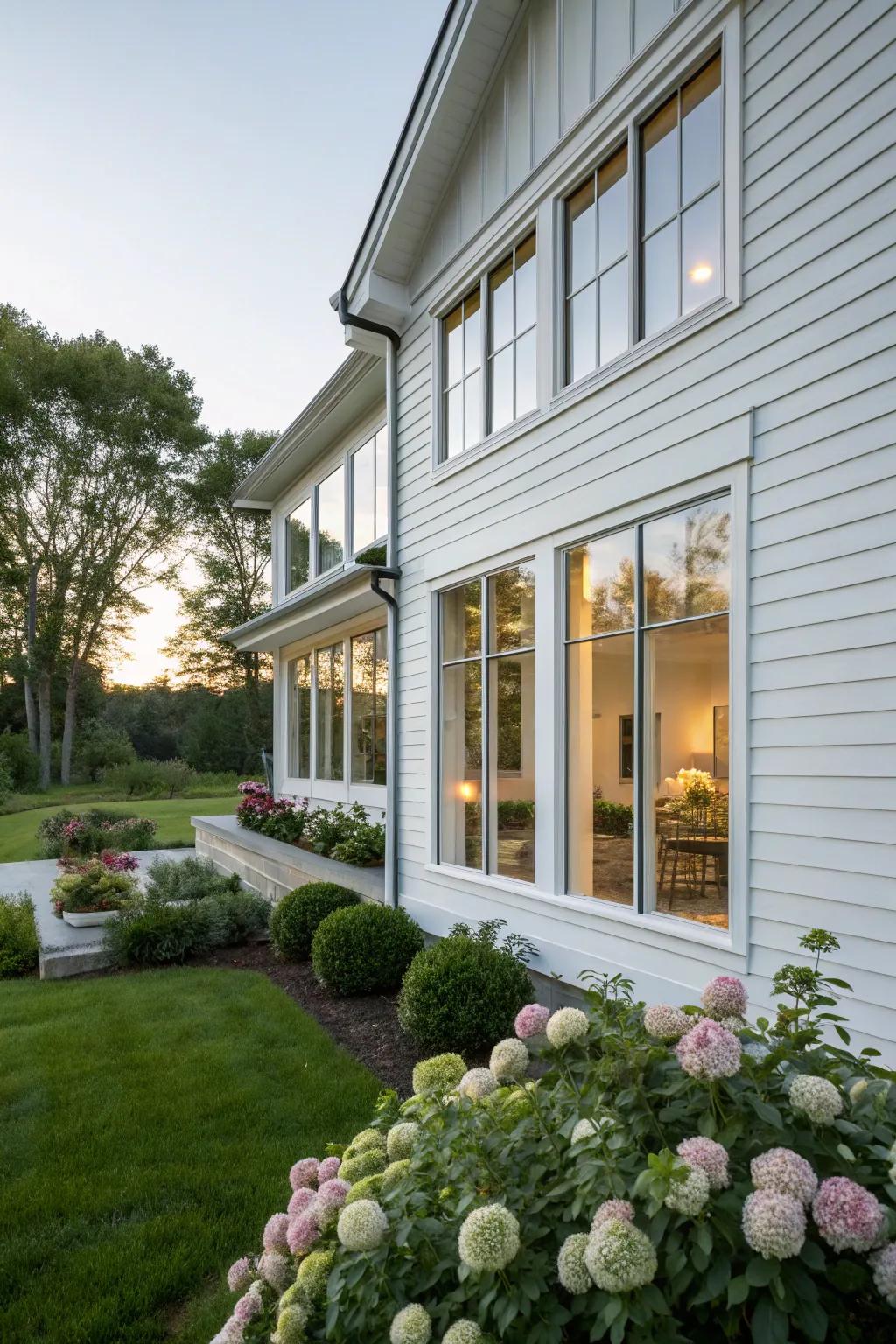 A radiant and airy white facade graced with expansive windows.