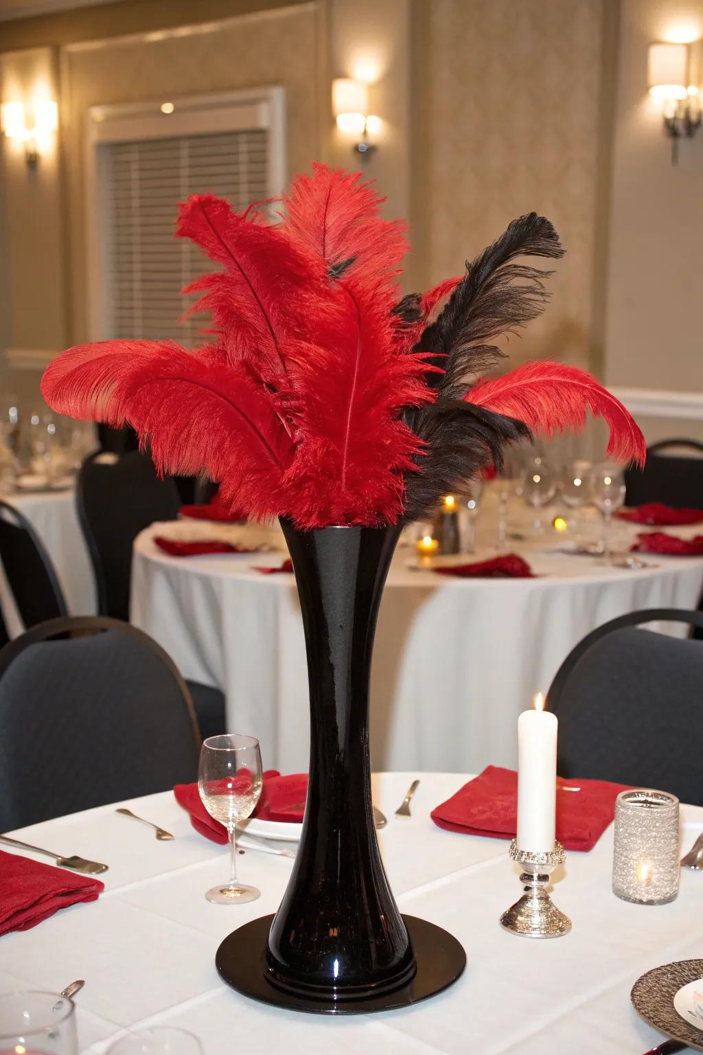 Red feathers artistically arranged in a black vase for dramatic flair.