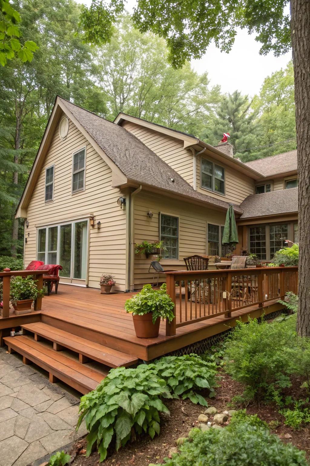 A rustic red cedar deck infuses a vibrant touch to a tan house, blending beautifully with the natural environment.