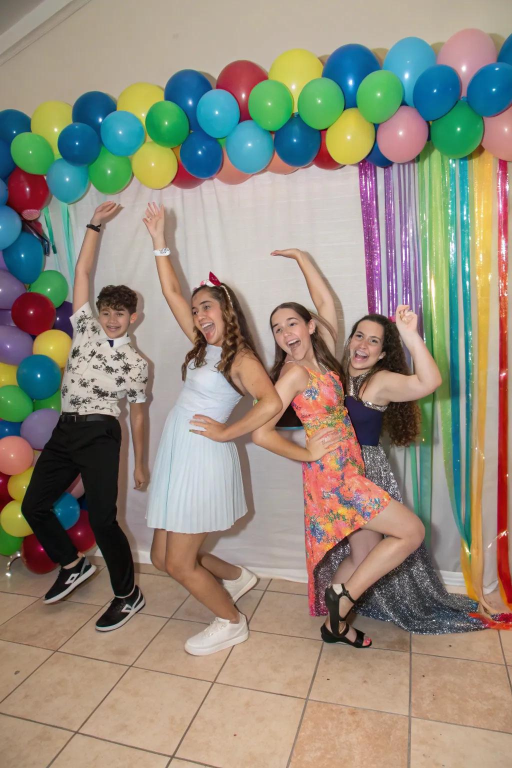 Teens striking creative poses at a sweet sixteen.