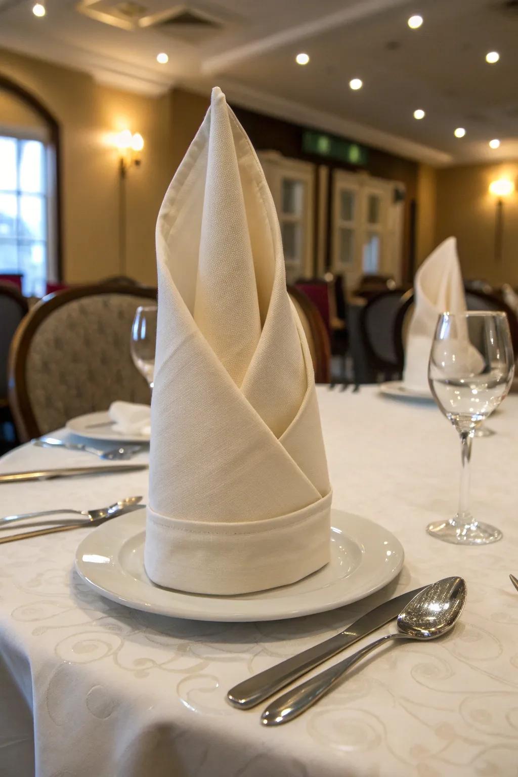 The Clerical Hat napkin fold adds a sophisticated detail.