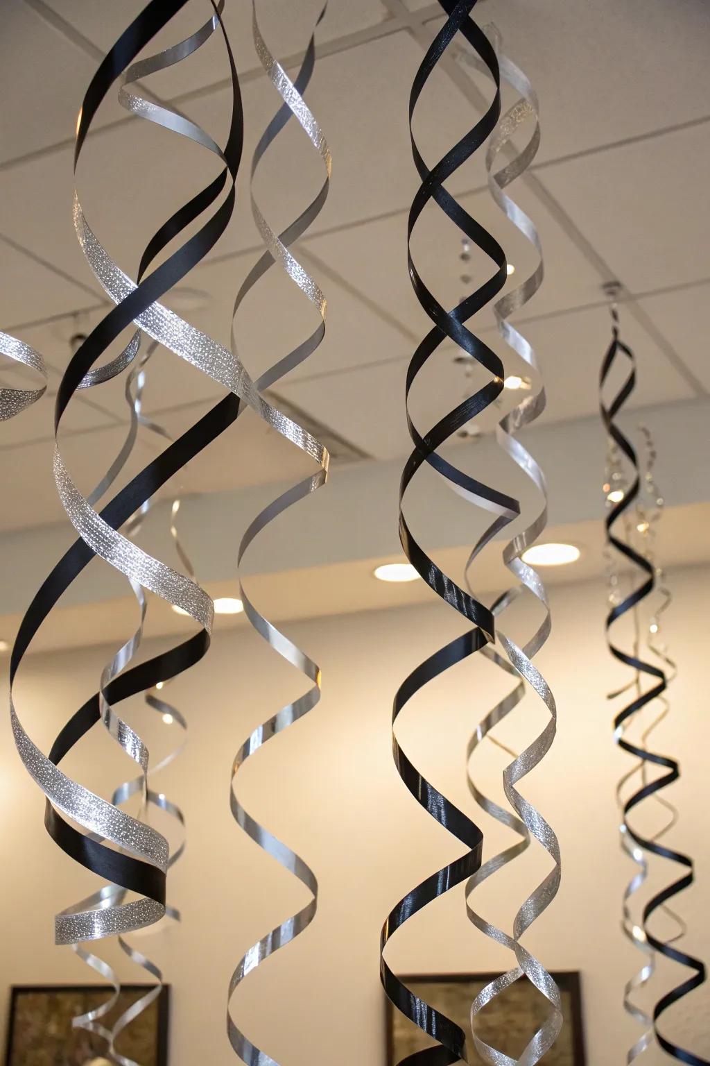 Glistening black and silver streamers create a festive ambiance.