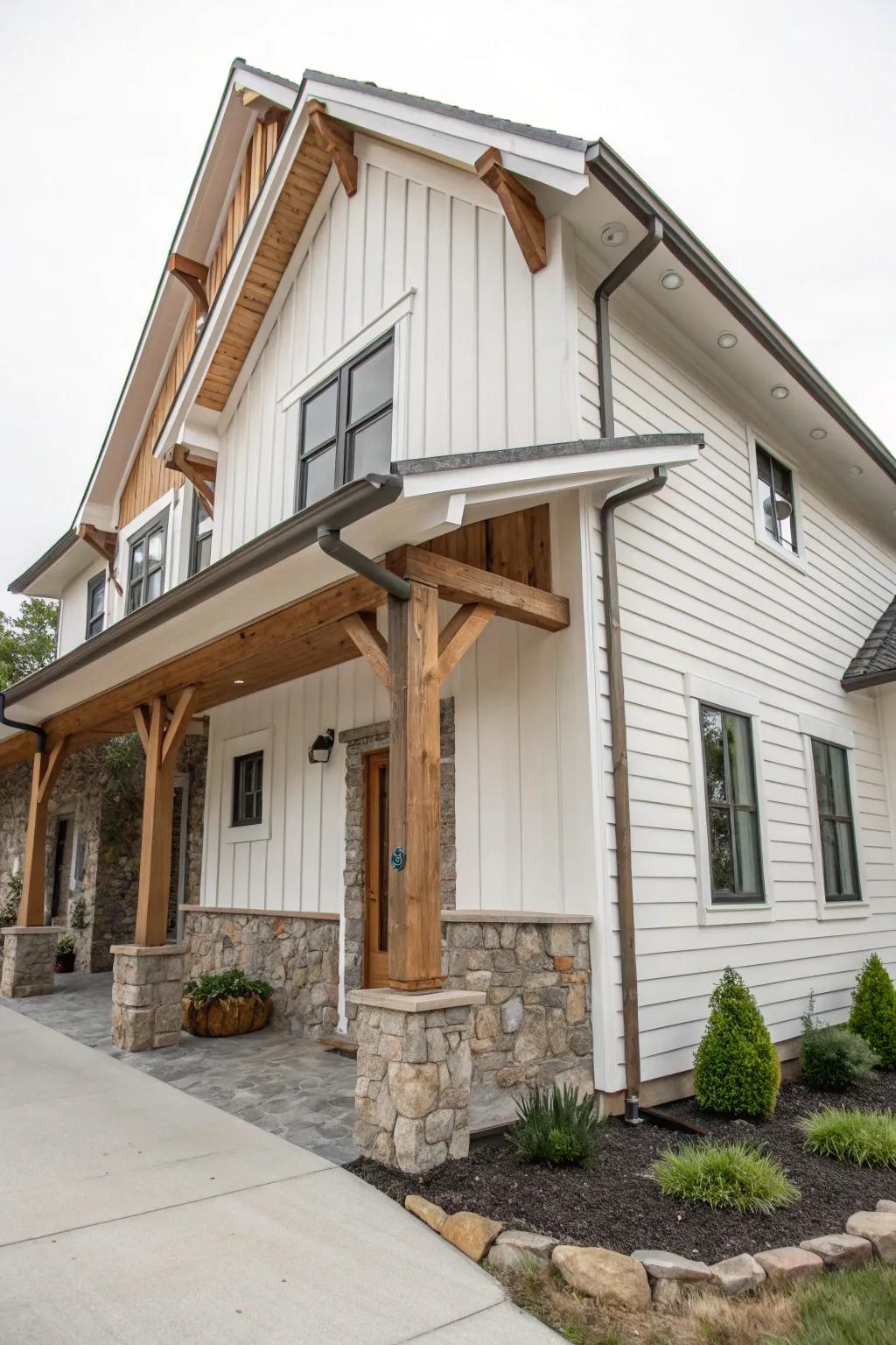 A harmonious blend of wood and stone elements complementing a white facade.