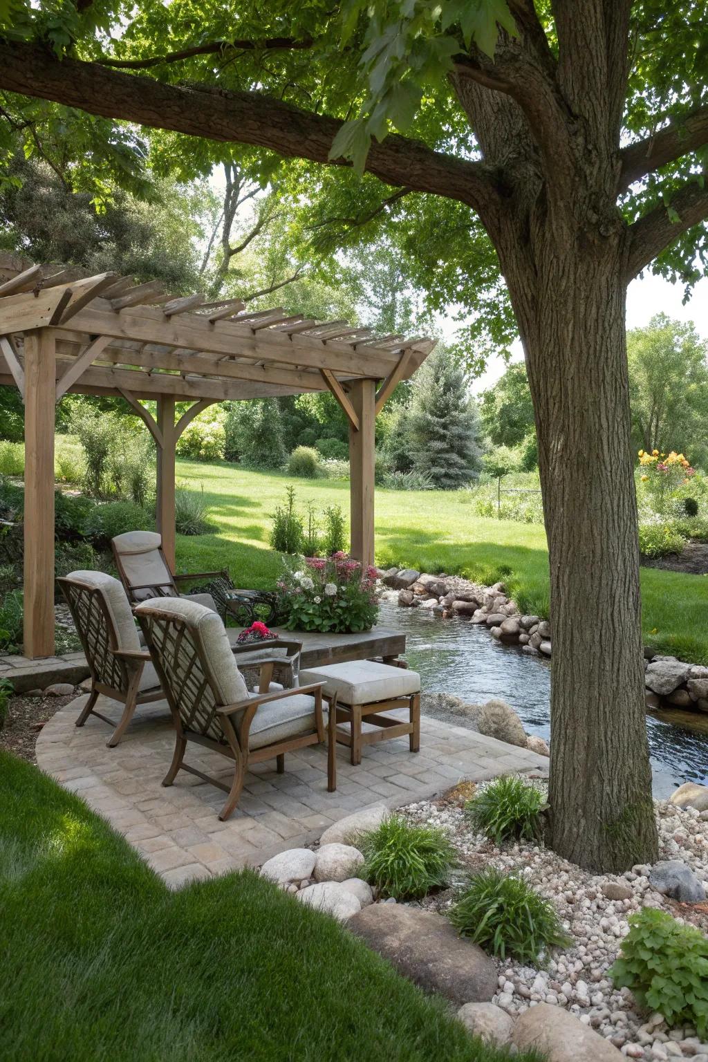 Shaded seating areas provide a cozy retreat in your creekside landscape.