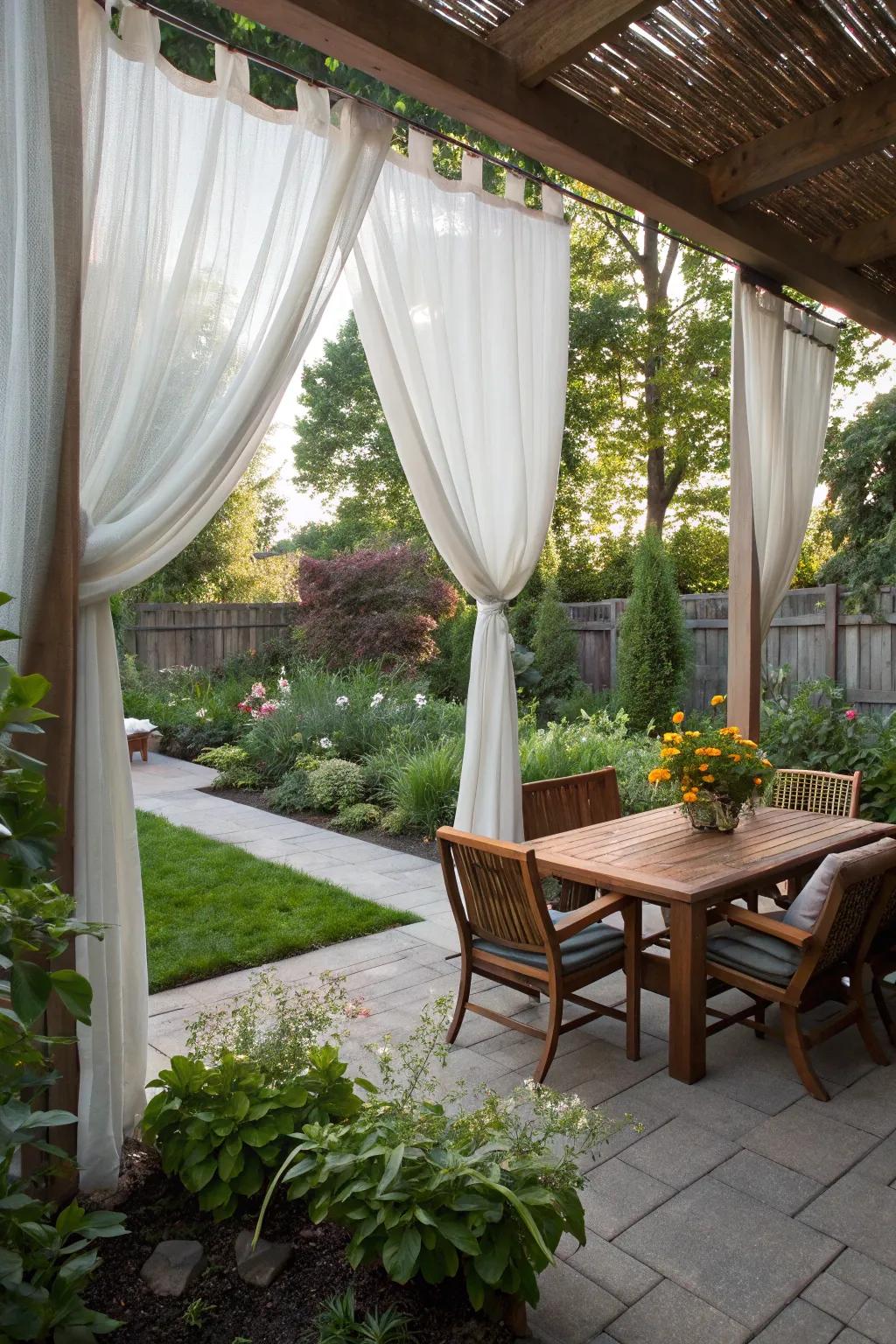 Elegant outdoor curtains creating a breezy private space.