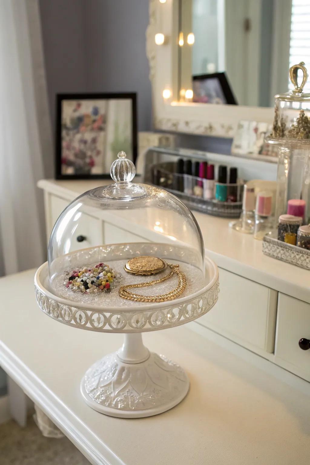 Organize your jewelry pieces with elegance beneath a glass dome.