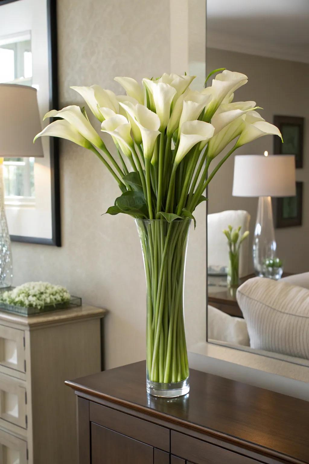 Elegant calla lily arrangement bestowing sophistication upon a dining space.